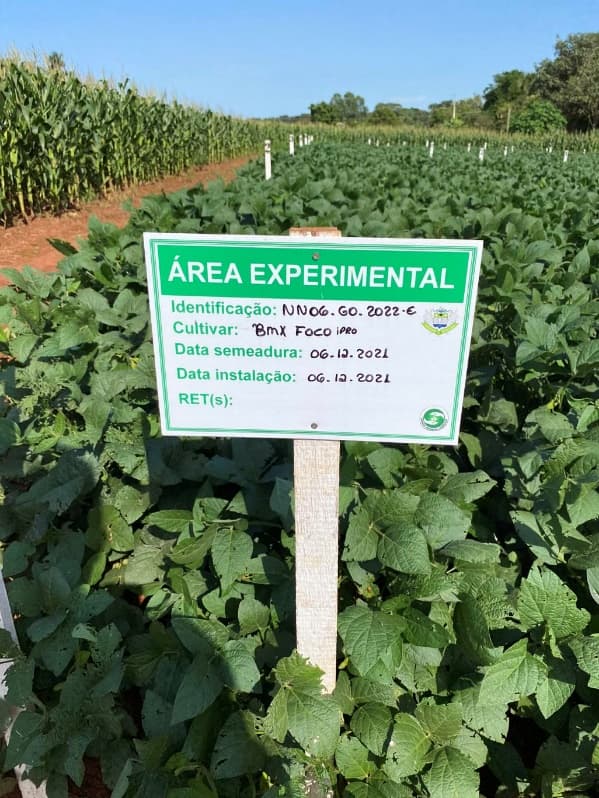 Image of sign in crop field depicting cultivar testing and registration trials